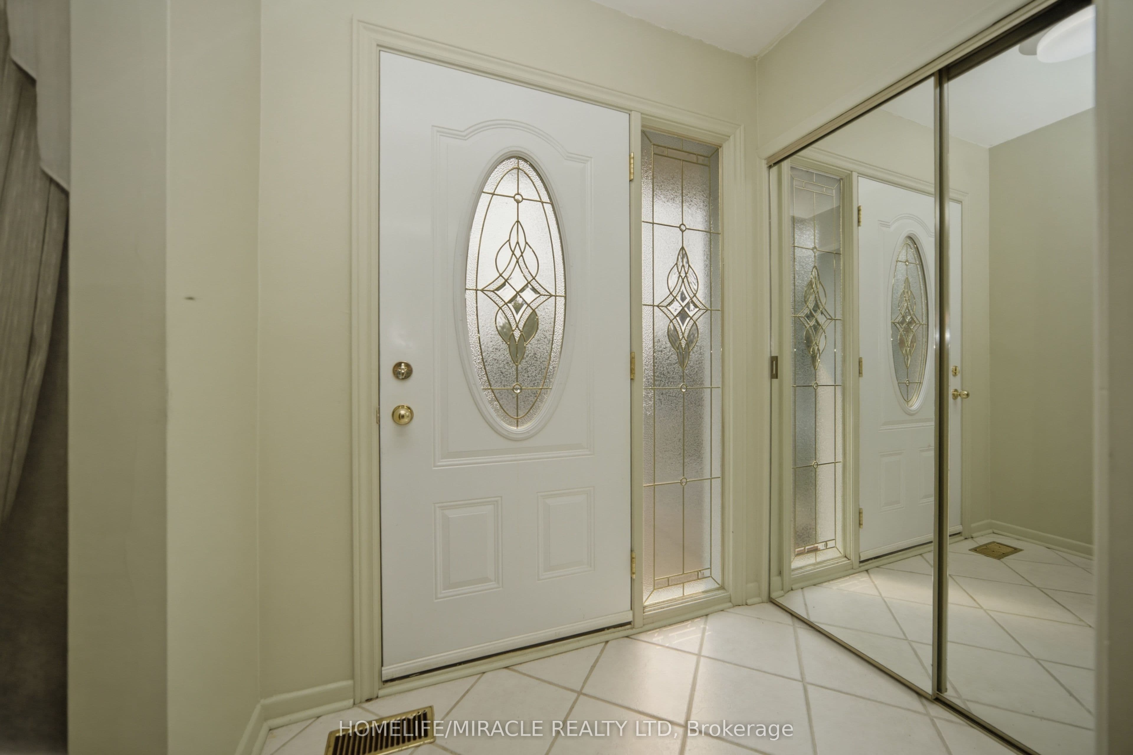 Mirrored Entrance Double-Door Closet